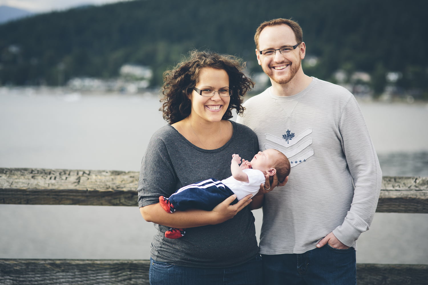 Parents Holding Baby at Rocky Point